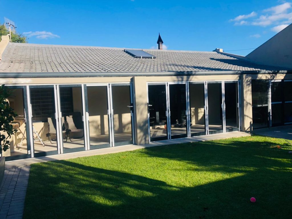 Aluminium stacking doors installed by Kiki Projects in Cape Town