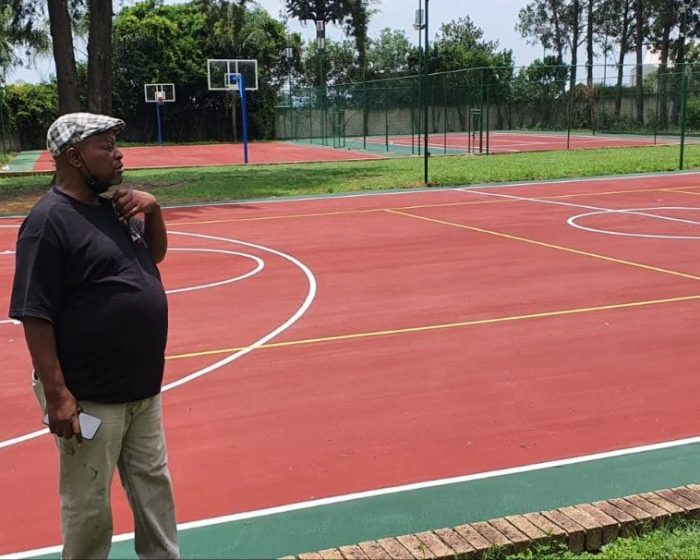 Multi-purpose sports court with basketball markings built by Kiki Projects